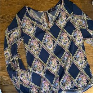 Blue patterned long sleeved blouse